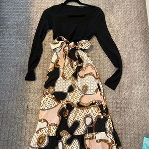 long sleeve maxi dress with black sleeves and floral skirt